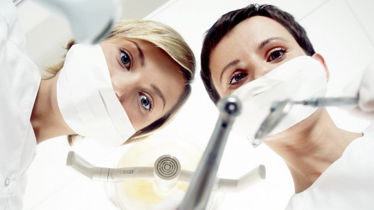 Dentistas.